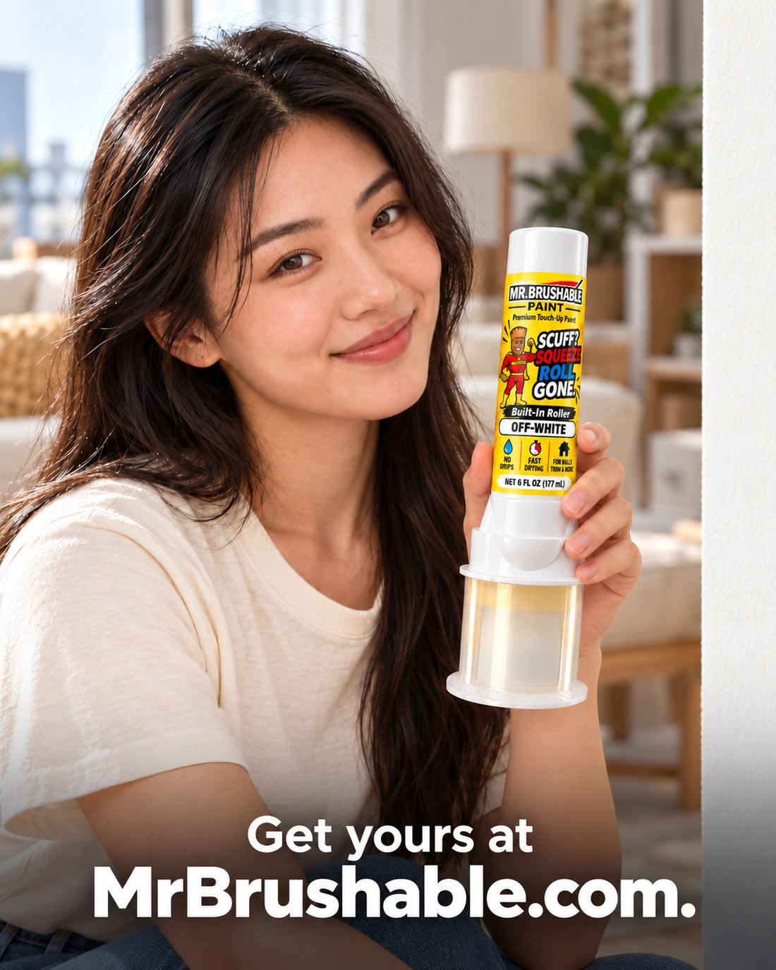 Woman at home holding the Mr. Brushable touch-up paint bottle with built-in roller in Off-White